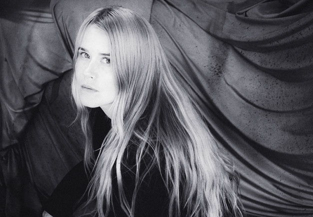 A back and white photo of a woman.