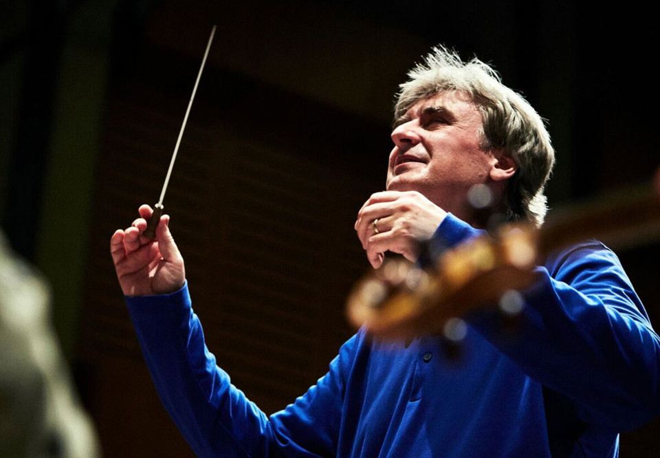 Man som dirigerar. Fotografi