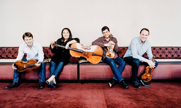 Four musicians. Photo.