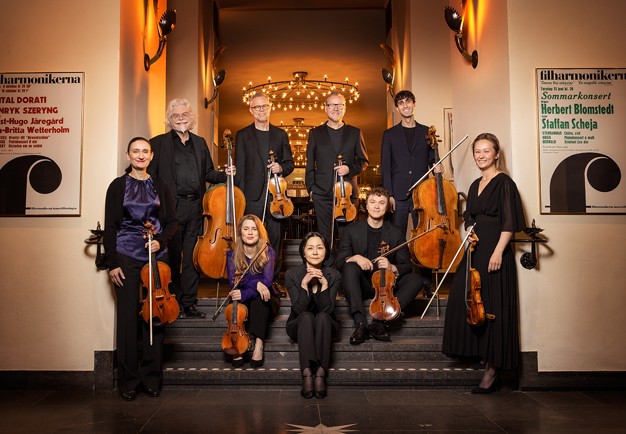 Musiker med instrument. Fotografi.