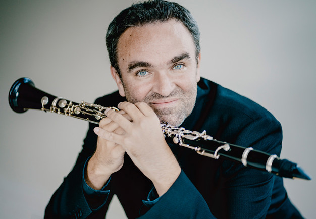 Man med klarinett. Fotografi